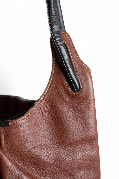 Cartera chica de cuero Adriana Constantini
